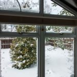 conservatory looking out to garden with snow